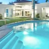 bluestone curved drop edge pool coping tiles, pool coping pavers, blues tiles, dark tiles, black tile