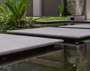 raven granite pool coping bullnose tiles, grey coping tiles, dark coping tiles, black granite pool coping by stone pavers australia, pool steppers