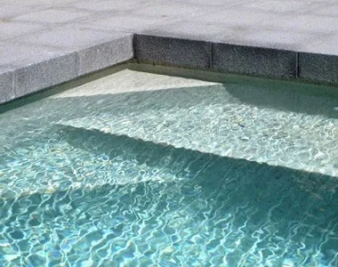 raven grey granite drop face pool coping tiles and pavers, black pool coping tiles, dark pool coping tiles by stone pavers melbourne sydney brisbane ,canberra adelaide