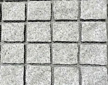 Dove White natural split cobblestone tiles and pavers