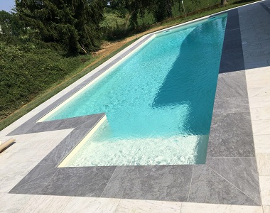 grey pool coping bullose, grey tiles, grey limestone pavers and light tiles by stone pavers melbourne, sydney, canberra
