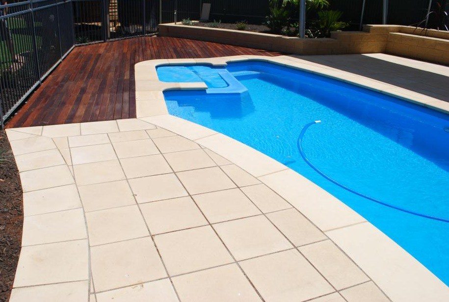 sandstone pavers and pool coping