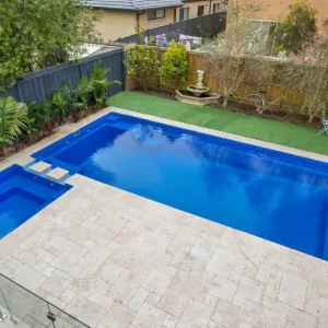 Ivory travertine french pattern around pool