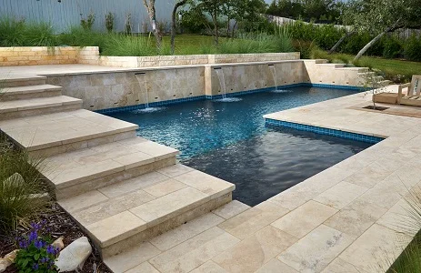 ivory travertine pool coping tumbled tiles, cream stepping coping, biege tiles by stone pavers melbourne and sydney
