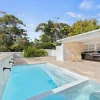 travertine tiles and matching crazy paving