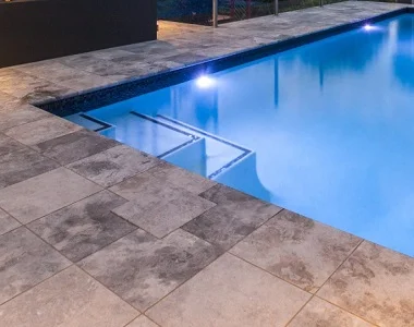 silver oyster travertine bullnose pool coping, round edge pool coping, silver pool coping tiles by stone pavers