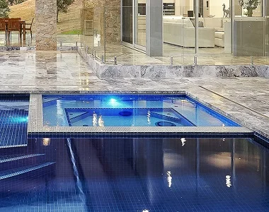 silver travertine pool coping tumbled tiles, silver tiles, silver coping, silver pavers by stone pavers melbourne