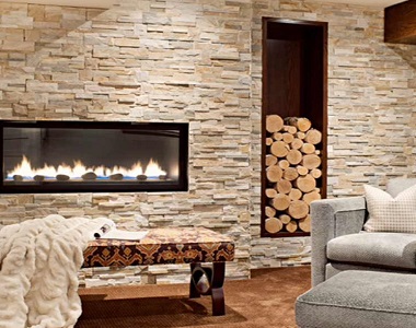 travertine stackstone wall cladding near fireplace