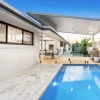 travertine crazy paving pool area
