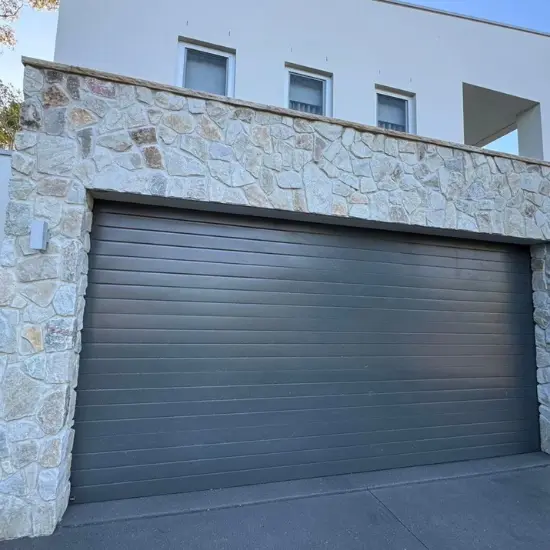 loose stone cladding garage feature