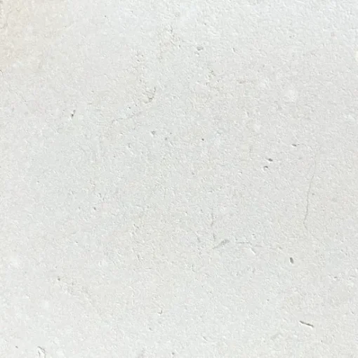 close up image of white limestone pavers